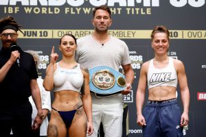 Ebanie Bridges in stitches as Eddie Hearn desperately tries not to stare at topless OnlyFans fighter at weigh in