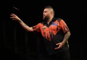 Darts star Michael Smith praying his ‘a**e doesn’t fall out again’ as he flies to New York to defend crown