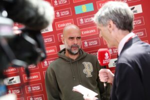 Why does Pep Guardiola have ‘P’ on his hoodie during Manchester City games?