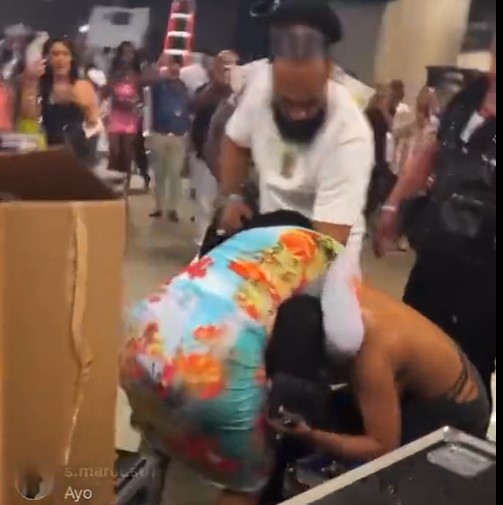 Reality TV star and topless rapper fight in shocking backstage brawl at Mayweather vs Gotti III