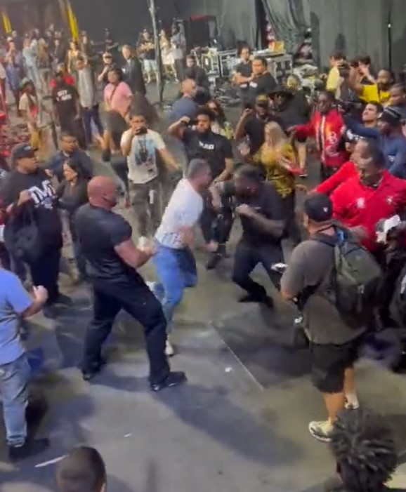 Watch insane mass brawl break out in crowd at Mayweather vs Gotti III as men wildly swing at each other