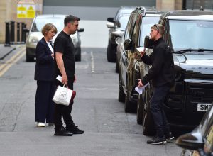 Fan crashes into Gary Neville’s car then cheekily asks for selfie with Man Utd legend as he inspects damage