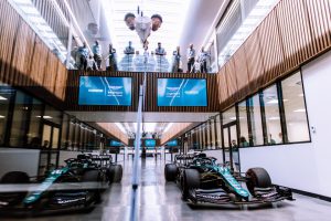 Moment Lance Stroll blasts his F1 car through a factory to christen Aston Martin’s new Silverstone HQ