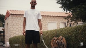 Fabinho holds TIGER on a chain as Al-Ittihad transfer is confirmed with fans asking ‘have we sold him to the circus?’