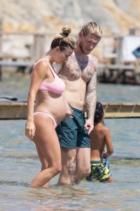 Diletta Leotta shows off growing baby bump in bikini as she enjoys beach holiday with footballer boyfriend Loris Karius