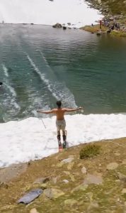 Watch skier slide over lake in insane trick as stunned fans say ‘that’s so f***ing cool’