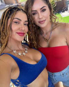 Stunning octagon girls Arianny Celeste and Brittney Palmer sizzle in red and blue low-cut tops to celebrate 4th July