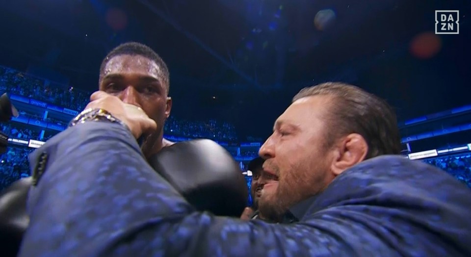 Bloodied Anthony Joshua swigs Conor McGregor’s Forged Irish Stout immediately after KOing Robert Helenius