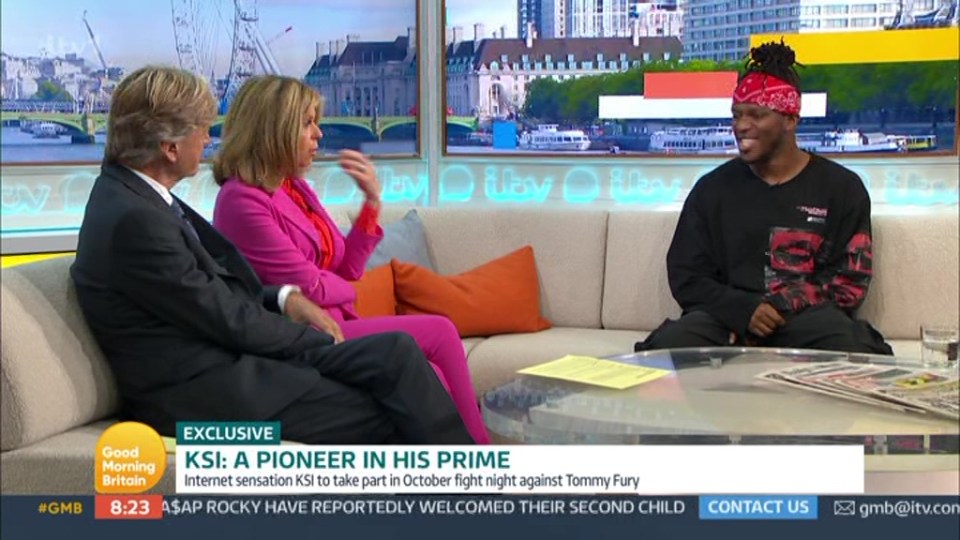 Awkward moment KSI has to tell Kate Garraway to ‘calm down’ live on GMB as she PUNCHES Richard Madeley