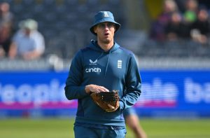 Freddie Flintoff smiles on his last day with England cricket team after mentoring mates