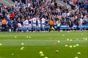 Match SUSPENDED as furious fans launch tennis balls onto the pitch in bitter protest