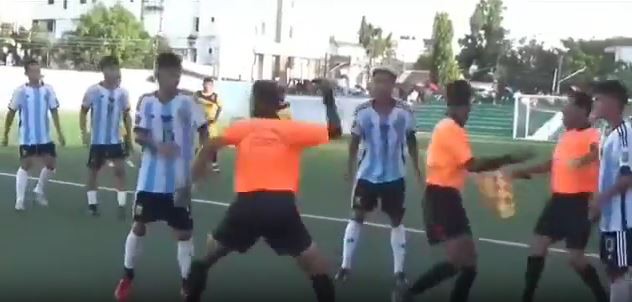 Watch moment shocking brawl breaks out as football stars chase and attack referee who turns around and throws PUNCHES