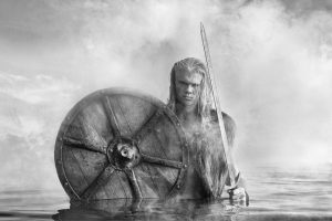 Erling Haaland dresses as a viking in freezing lake for stunning photoshoot complete with shield and huge sword