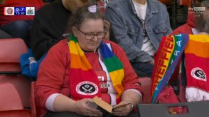 Fans ask ‘am I seeing this right?’ as Sheff Utd supporter goes viral for casually reading a book during Newcastle match