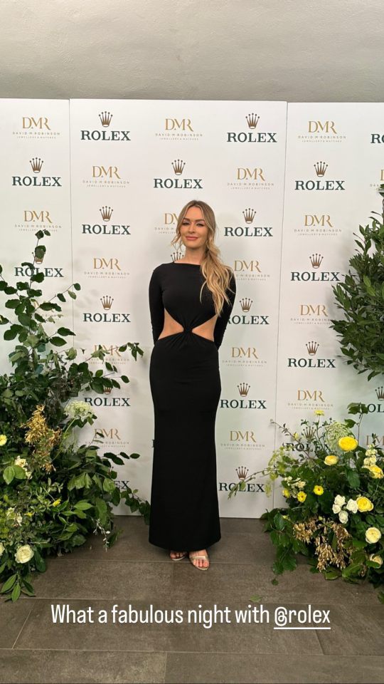 Laura Woods shows off her abs and stuns in black cutout dress as presenter attends Rolex dinner