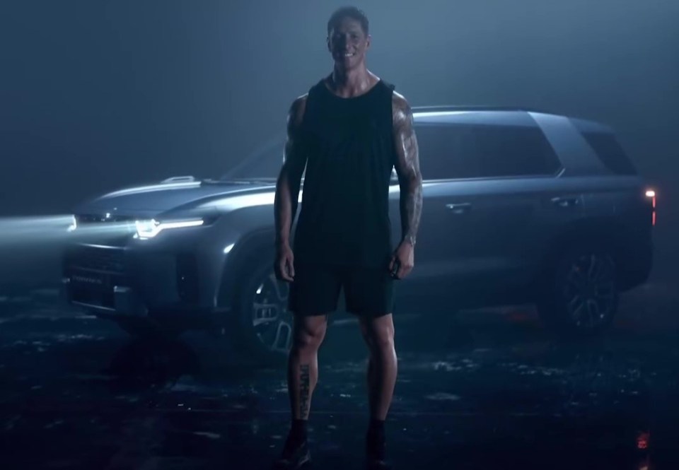 Fernando Torres looks bigger than ever with new bodybuilder frame as he shows off bulging muscles in car advert