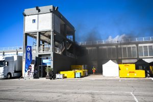 Man rushed to hospital after huge explosion at Formula E testing as garage catches fire & scared staff scream ‘get out’