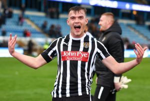 Man Utd legend’s grandson scores screamer on debut for EFL club to win match sparking wild scenes in stands