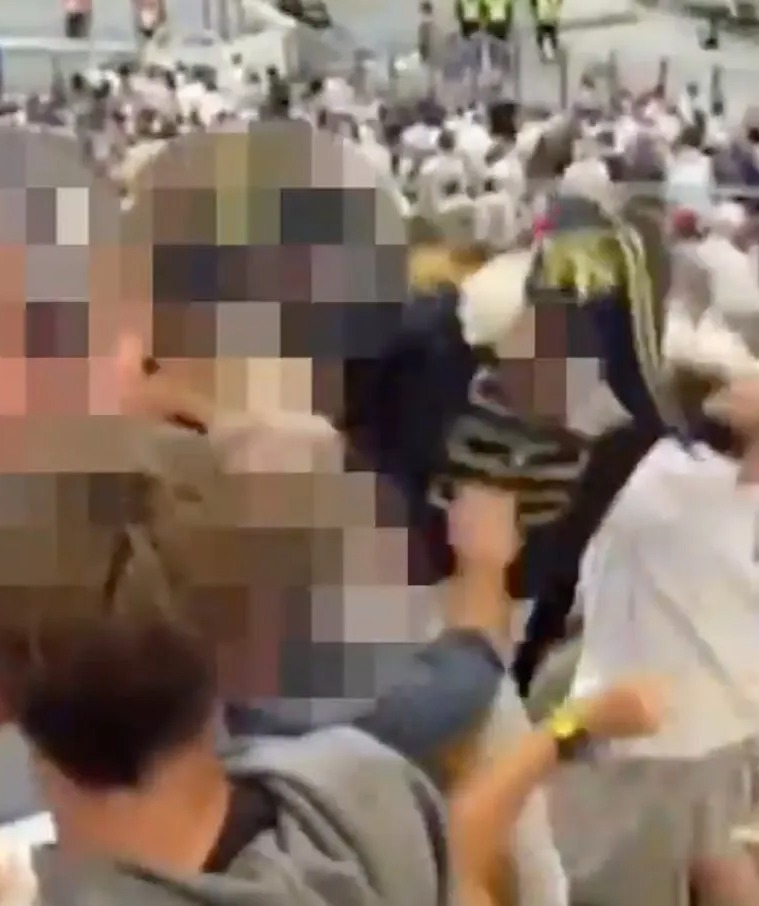 Moment rugby fans in fancy dress begin fighting inside stadium during England vs Fiji quarter-final in Marseille