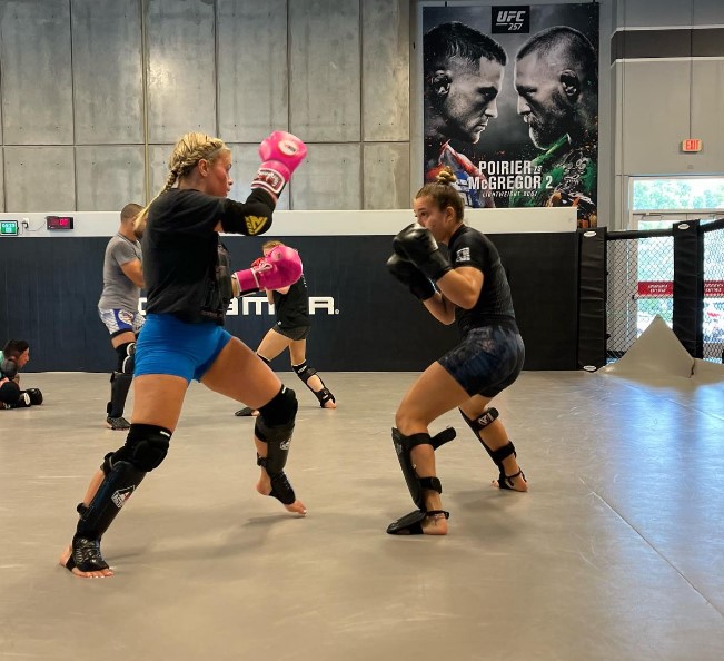 OnlyFans star Paige VanZant hints at shock UFC comeback as she spars in gym – but is left laid out