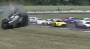 Terrifying moment car flips seven times before ending up a mangled shell with 19-year-old racing driver inside