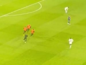 Major security breach as pitch invader is able to grab Kylian Mbappe before leading PSG stewards on chase around field