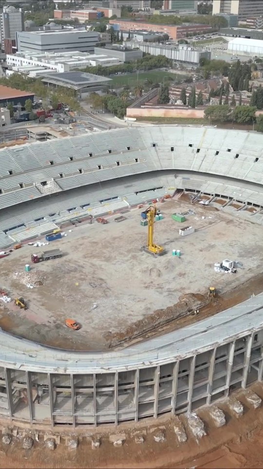 Iconic stadium looks unrecognisable as new footage reveals crane on pitch and every seat removed