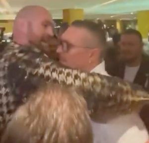 Tyson Fury and Oleksandr Usyk come face to face in Saudi Arabia after Gypsy King threatens to SUE Ukrainian