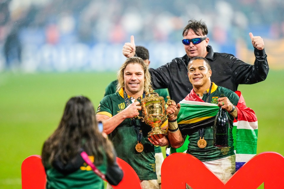 Serial prankster Daniel Jarvis invades pitch during Rugby World Cup final and even touches trophy