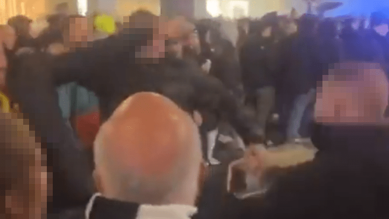 Shocking moment Borussia Dortmund and Newcastle fans fight in street before Champions League game – with nine arrested