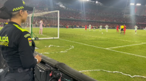 Football fans beg ‘arrest me’ as glamorous police officer goes viral for celebrating goal from sidelines