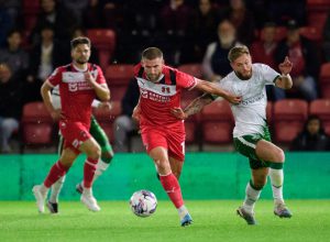 Leyton Orient match ABANDONED after desperate fans ran onto pitch to stop game for medical emergency in stands