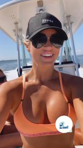 Paige Spiranac rival Karin Hart shows off sensational body in revealing bikini while relaxing on sun on boat