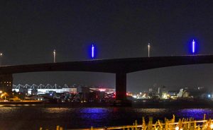 Southampton fans fighting to switch lights on bridge by ground — as it’s lit up in rival Portsmouth’s colours