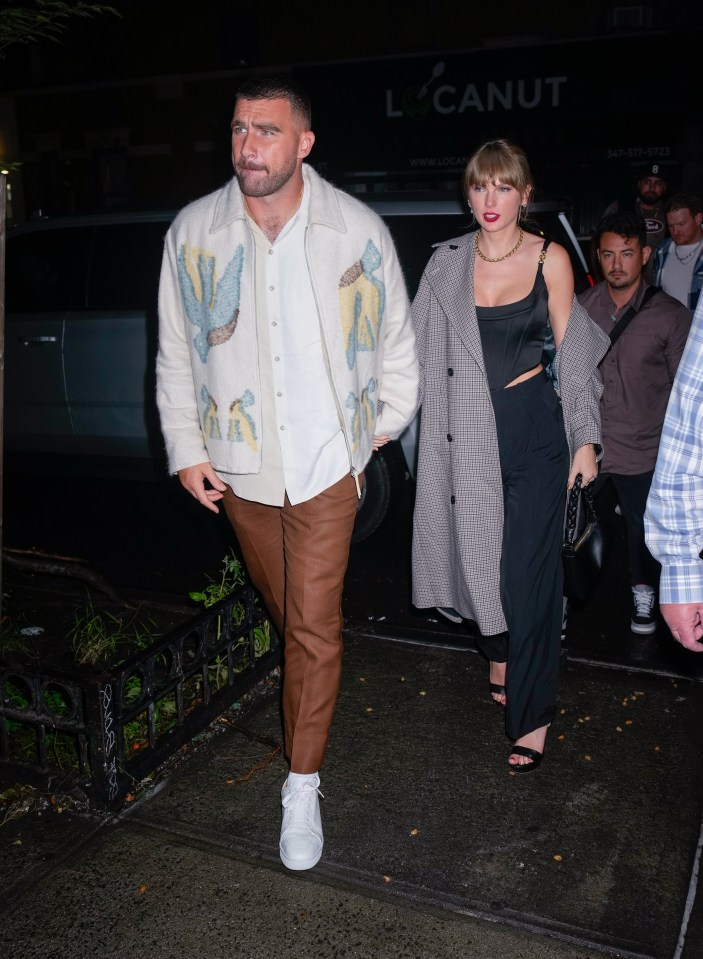 Taylor Swift and Travis Kelce hold hands on way to after party in first PDA since dating rumors began