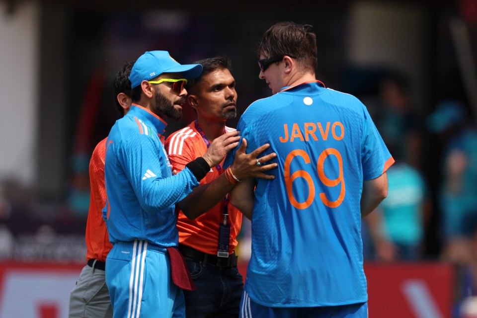 Notorious prankster Jarvo 69 invades the pitch at cricket World Cup and squares up to angry India superstar Virat Kohli