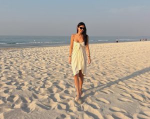 Kelly Piquet stuns in low cut dress on beach in Abu Dhabi ahead of boyfriend Max Verstappen’s final race of season