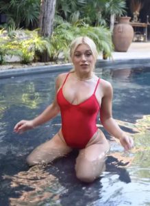 Elle Brooke gives fans more than they bargained for in tiny swimsuit while relaxing in pool