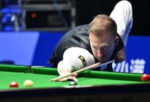 Snooker star Judd Trump ‘goes full Michael Owen’ after storming to brutal win over 12-YEAR-OLD opponent