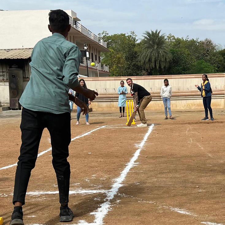 Footie hero David Beckham snapped showing kids in India his cricket skills