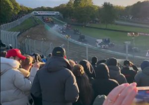 Brands Hatch: Dramatic moment families narrowly escape death as trucks crash yards away from them – wiping out fence