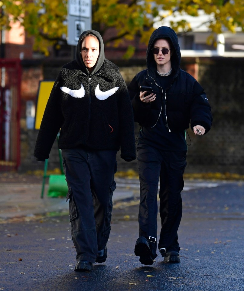 Alex Scott and Jess Glynne rock matching outfits for North London walk days after confirming relationship with kiss