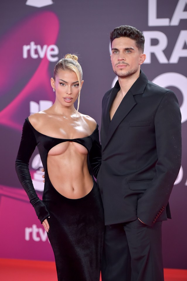 Ex-Barcelona Wag and ‘world’s hottest woman’ nearly bursts out of tiny dress at Latin Grammy Awards