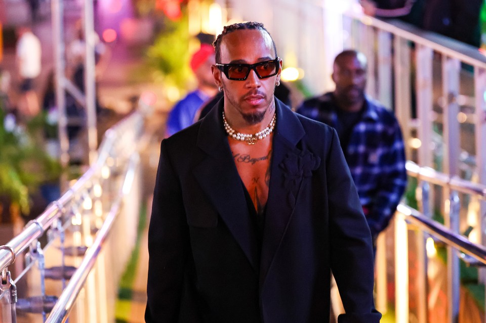 Lewis Hamilton strolls Las Vegas red carpet in black trenchcoat as fans say F1 legend ‘spawned in the Matrix’