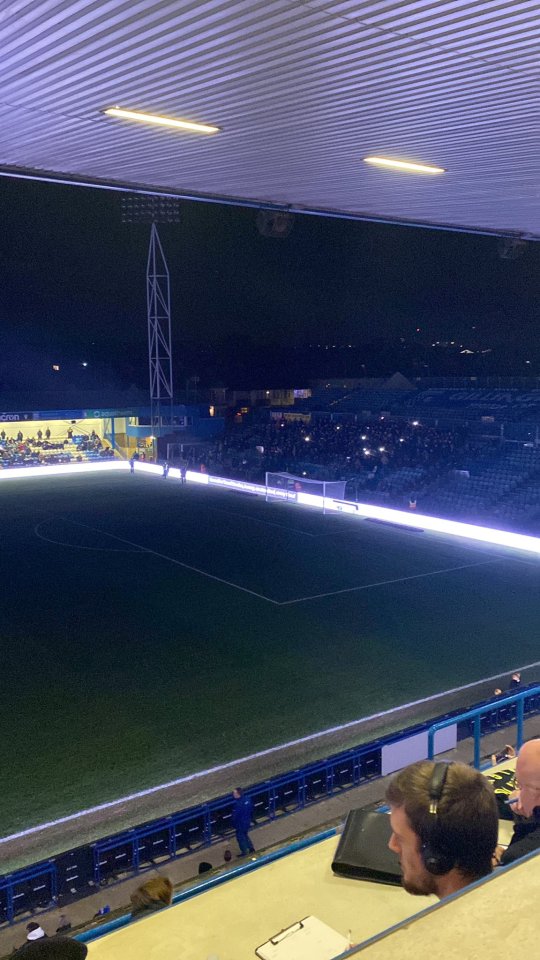 League Two clash SUSPENDED after power cut as pitch is plunged into darkness mid-match and away fans sing cheeky chant