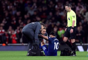 West Ham star Lucas Paqueta collapses to ground and forced off in Arsenal clash after limping out of warm up