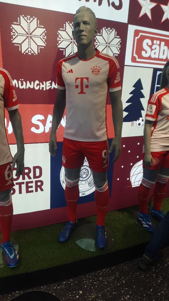 German footie fans caught fondling life-sized model of Harry Kane at FC Bayern Store in Munich