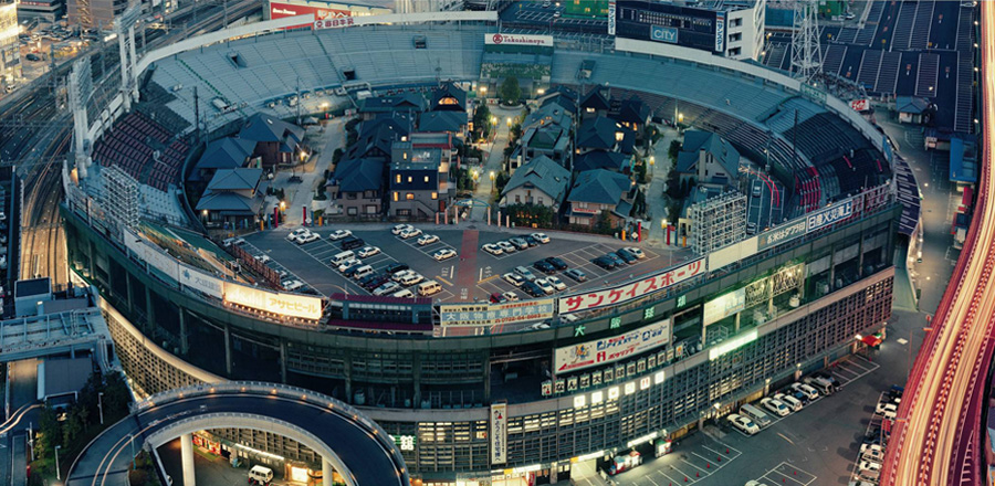 Abandoned baseball stadium turned into ‘residential neighbourhood’ complete with car park & brand new homes on the field