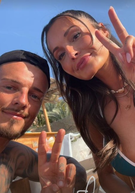 Arsenal star Ben White and wife Milly relax on the beach as they jet off on holiday during winter break