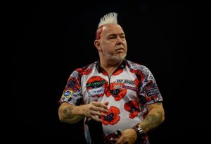 Two-time darts world champion Peter Wright wishes Luke Littler happy 17th birthday by throwing away all of his trophies